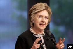 FILE - Former Secretary of State Hillary Clinton speaks in Baltimore, June 5, 2017.