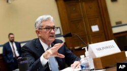 FILE - Federal Reserve Board Chairman Jerome Powell testifies during a House subcommittee hearing on Capitol Hill in Washington, June 22, 2021.