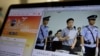 A photo described as the trial showing human rights lawyer Xie Yang which is seen on the social media of the Changshai Intermediate People's Court is displayed on a computer in Beijing, China, May 8, 2017.