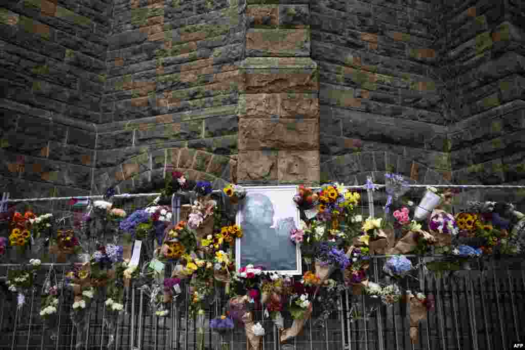 A view of the Wall of Remembrance at St. Georges Cathedral, is set up to honor the passing of South African anti-Apartheid icon Archbishop Desmond Tutu, in Cape Town.