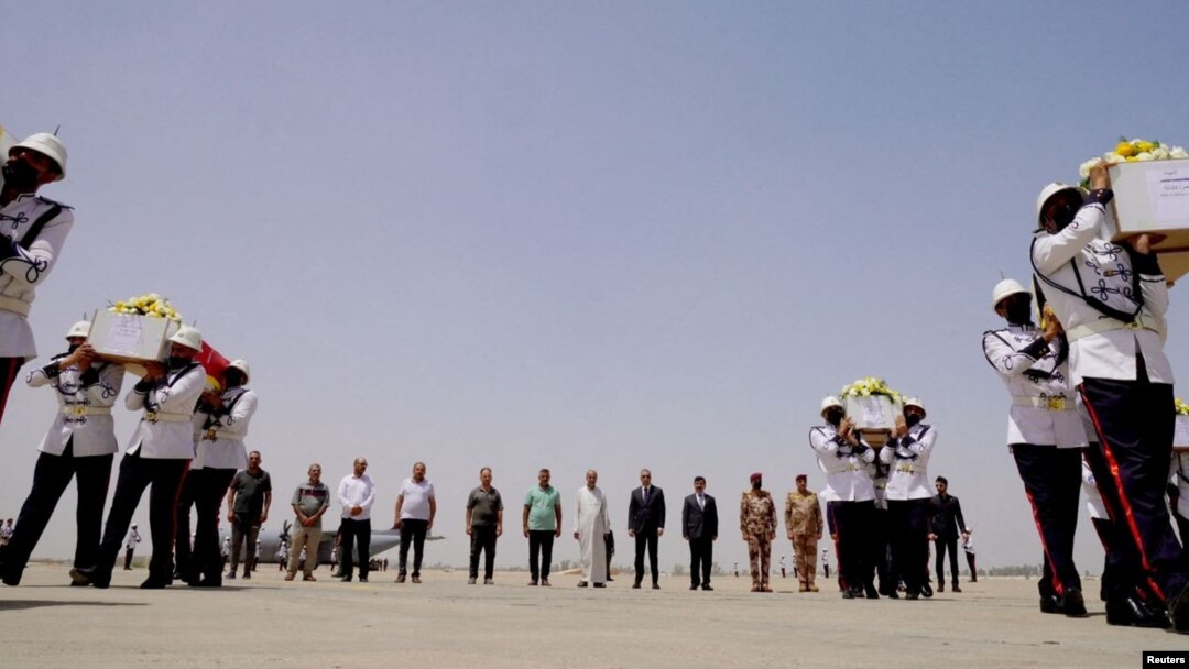مەڕاسیمی پێشوازیکردن لە تەرمی قوربانییەکان، فڕۆکەخانەی نێودەوڵەتی بەغدا