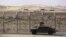 FILE - An armored Israeli military vehicle drives along Israel's border with Egypt's Sinai peninsula in January 2014. 