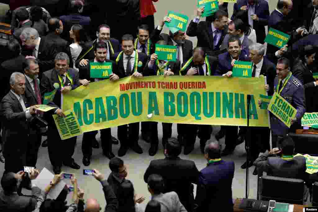 Lower house members who support impeachment for Brazilian President Dilma Rousseff demonstrate during a session to review the request, at the Chamber of Deputies in Brasilia.