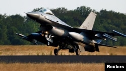 FILE- A Dutch F-16 fighter jet is seen at the Volkel Air Base in Volkel, Netherlands, June 9, 2023