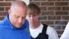 Charleston, S.C., shooting suspect Dylann Storm Roof, center, is escorted from the Shelby Police Department in Shelby, North Carolina, June 18, 2015.