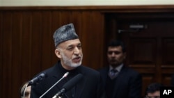 Afghan President Hamid Karzai during final address to parliament Kabul, March 15, 2014.