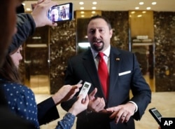 FILE - Jason Miller, a senior adviser to then-President-elect Donald Trump, speaks to reporters at Trump Tower, Nov. 16, 2016, in New York.