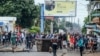 Protesters fill the street as police deploy in Maputo, Mozambique, Nov. 7, 2024. 