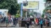 Protesters fill the street as police deploy in Maputo, Mozambique, Nov. 7, 2024. 