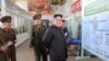 North Korean leader Kim Jong Un smiles during a visit to the Chemical Material Institute of the Academy of Defense Science in this undated photo released by North Korea's Korean Central News Agency in Pyongyang on Aug. 23, 2017.