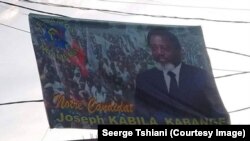 "Our candidate Joseph Kabila," reads a poster signed by the Friends of Mova Sakanyi (Amos - PPRD), located in the Lalu market, in the district Binza Delvaux, west of Kinshasa, May 6, 2018. (Twitter / Serge Tshiani)