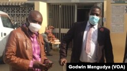 Frank Chikowero and Samuel Takawira In Court