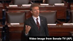 FILE - Sen. Rand Paul, R-Ky., speaks on the floor of the U.S. Senate, May 20, 2015.