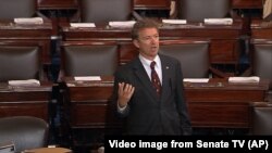 FILE - In this image from Senate video, Sen. Rand Paul speaks on the floor of the U.S. Senate, May 20, 2015.