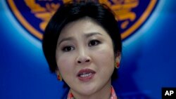Thailand's former prime minister, Yingluck Shinawatra, was placed under house arrest. She's shown during a press conference in Bangkok, Thailand, May 7, 2014. 