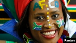A fan of South Africa is pictured before the team's international friendly soccer match against Algeria in Soweto, January 12, 2013. 