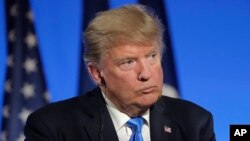 U.S President Donald Trump attends a press conference at the Elysee Palace in Paris, July 13, 2017.