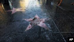 Donald Trump's star on the Hollywood Walk of Fame was vandalized Wednesday, July 25, 2018, in Los Angeles.