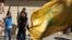 Hezbollah supporters fire weapons as they celebrate the fall of the Syrian town of Qusair to forces loyal to President Bashar Assad and Hezbollah fighters, in Bazzalieh village, Lebanon, near the Lebanese-Syrian border, June 5, 2013. 