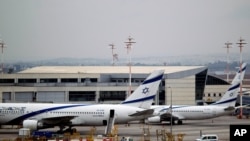 Israeli El Al planes are parked at Ben Gurion airport near Tel Aviv. Israel has listed an El Al flight taking off Aug. 31, 2020, for Abu Dhabi, which would be its first commercial passenger flight to the United Arab Emirates.