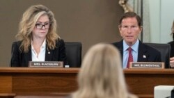 Sen. Marsha Blackburn, R-Tenn., left, and Sen. Richard Blumenthal, D-Conn., right speak to former Facebook data scientist Frances Haugen, center, during a hearing of the Senate Commerce, Science, and Transportation Subcommittee on Consumer Protection, Pro