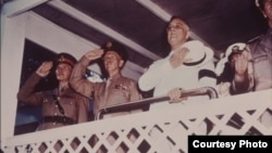 President Franklin Delano Roosevelt reviewing the 1942 Memorial Day Parade in Washington, D.C. with Sir John Dill, General George Marshall, and Admiral Ernest J. King. on May 30, 1942. (Photo courtesy of the FDR Presidential Library)