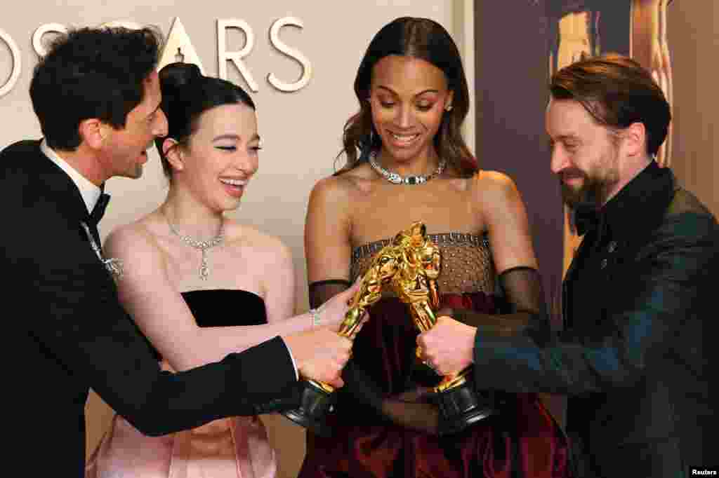 Mikey Madison, winner of the Oscar for Best Actress for &quot;Anora&quot;, Adrien Brody, winner of the Oscar for Best Actor for &quot;The Brutalist&quot;, Zoe Saldana, winner of the Oscar for Best Supporting Actress for &quot;Emilia Perez&quot;, and Kieran Culkin, winner of the Oscar for Best Supporting Actor for &quot;A Real Pain&quot;, pose in the Oscars photo room at the 97th Academy Awards in Hollywood, Los Angeles, California, March 2, 2025.