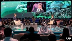 FILE - Jared Kushner (R), adviser to former US president Donald Trump, and Italy's former prime minister Matteo Renzi (L) participate in a panel at the annual Future Investment Initiative (FII) conference in Riyadh on October 25, 2023.