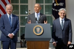 From left, Vice President Joe Biden listens as President Barack Obama announces the nomination of federal appeals court judge Merrick Garland for the Supreme Court, in the White House Rose Garden, Washington, March 16, 2016.