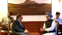 US Secretary of Defense Leon Panetta, second from left, speaks with Indian Prime Minister Manmohan Singh June 5, 2012.