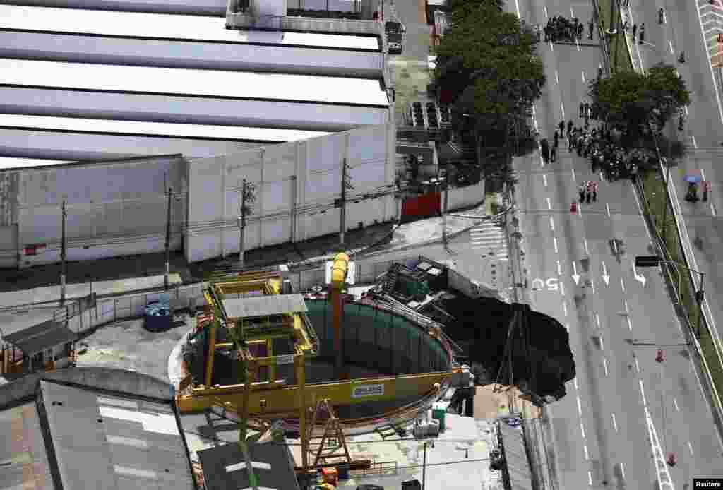 An aerial view shows part of an expressway collapsed above a construction site where Spain's Acciona SA was excavating a tunnel for a new metro line in Sao Paulo, Brazil.