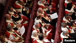 FILE - Members of the House of Lords are seen seated in Parliament, in central London, Britain, June 21, 2017. 