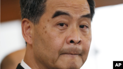 FILE - Leung Chun-ying at a press conference.