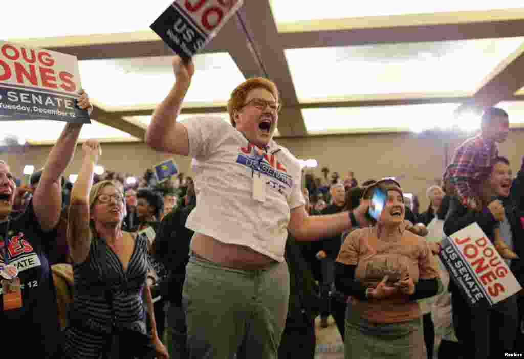 Supporters celebrate for Democratic Alabama U.S. Senate candidate Doug Jones at the election night party in Birmingham, Alabama, Dec. 12, 2017.