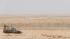 یک خودروی متعلق به نیروهای مرزبانی عربستان سعودی در حال گشت زنی در کنار مرزهای مشترک با عراق