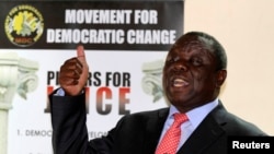 FILE - Zimbabwe opposition Movement for Democratic Change (MDC) leader Morgan Tsvangirai addresses a news conference in Harare, Sept. 18, 2013.