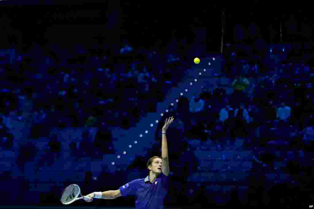 Danil Medvedev of Russia returns the ball to Hubert Hurkacz of Poland during their ATP World Tour Finals singles tennis match, at the Pala Alpitour in Turin, Italy.