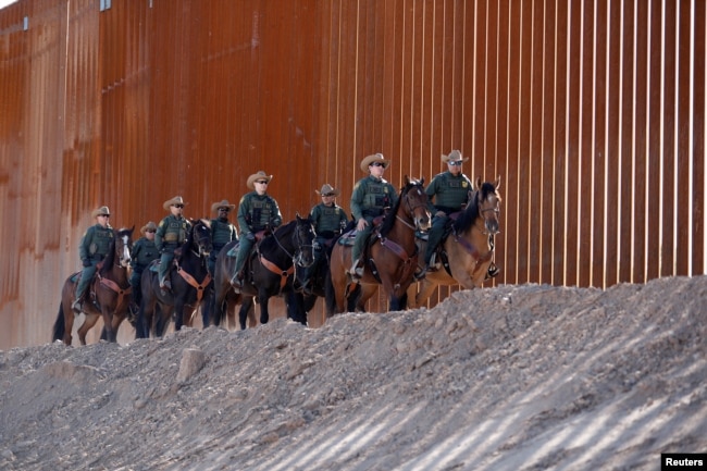 A mounted detachment of the U.S. Border Patrol along the wall during U.S. Department of Homeland Security Secretary Kirstjen Nielsen's visit to the El Centro Sector in Calexico, California, U.S., Oct. 26, 2018.