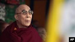 Tibetan spiritual leader, the Dalai Lama, looks on during the commemoration of the anniversary of the 1959 Tibetan uprising against Chinese rule in Dharmsala, India, March 10, 2011