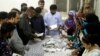 Pakistan Vote Tally Delayed; Khan Leads, Opponents Cry Foul