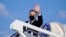FILE - U.S. Secretary of State Antony Blinken waves as he departs, Jan. 18, 2022, at Andrews Air Force Base, Maryland, en route to Ukraine, Germany and Switzerland.