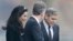 U.S. actor George Clooney, right, and his wife Amal Clooney, left, are accompanied by Merkel's foreign policy advisor Christoph Heusgen as they leave chancellery after private meeting with German chancellor Angela Merkel in Berlin, Germany, Feb. 12, 2016.