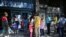 People wait in line outside of a currency exchange house in Caracas, Venezuela, Feb. 5, 2019.