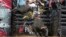 FILE - Amadeu Campos Silva (Brazil) menunggangi banteng Yippee High Cowboy di Grand Rapids, Michigan, Agustus 2021. (Andre Silva/Courtesy PBR/Bull Stock Media via AP)