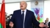 Belarusian President and presidential candidate Alexander Lukashenko visits a polling station during the presidential election in Minsk, Belarus, Jan. 26, 2025.