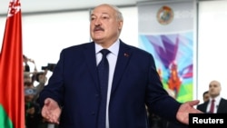 Belarusian President and presidential candidate Alexander Lukashenko visits a polling station during the presidential election in Minsk, Belarus, Jan. 26, 2025.