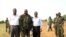 A picture released by Thabo Mbeki's spokesman shows former President of Burundi Pierre Buyoya and AU mediator for the Sudan crisis Thabo Mbeki with Sudan People's Liberation Army (SPLA) commander, Abdel Aziz al-Hilu (C), at his military headquarters in S