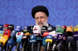 FILE - Iran's President-elect Ebrahim Raisi speaks during a news conference in Tehran, Iran, June 21, 2021.