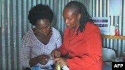 Health education translators like Susan Mwangi, right, in Kenya have to choose their words carefully to avoid offending cultural sensitivities