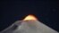 The Villarrica Volcano is seen at night from Pucon town, Chile.